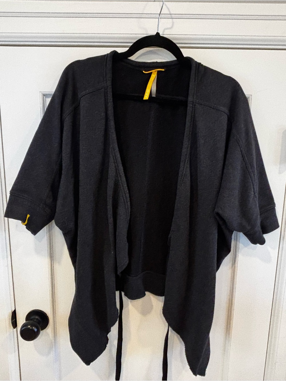 Women’s Soft Black Draped Open Cardigan with Yellow Accent from Lolë | Medium